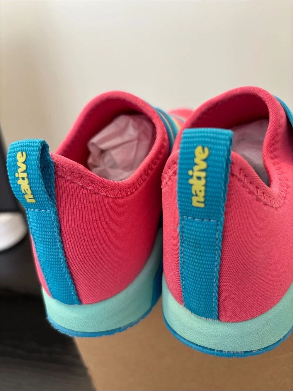 Native Phoenix Sugarlite Slip-On Sneakers in Pink with Rainbow Stripes